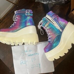 Demonia tiny imperfections. Bought in a bundle never worn.